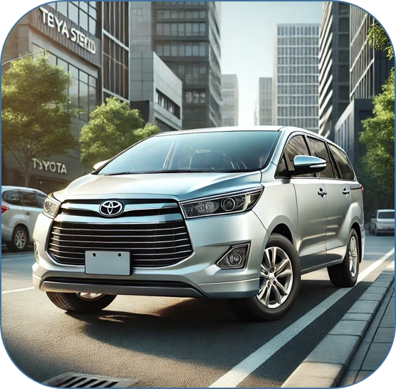 Toyota Innova MPV in a premium grey shade, parked on a wide road, featuring its large front grille, swept-back headlamps, and spacious, multi-purpose design ideal for families and long trips.