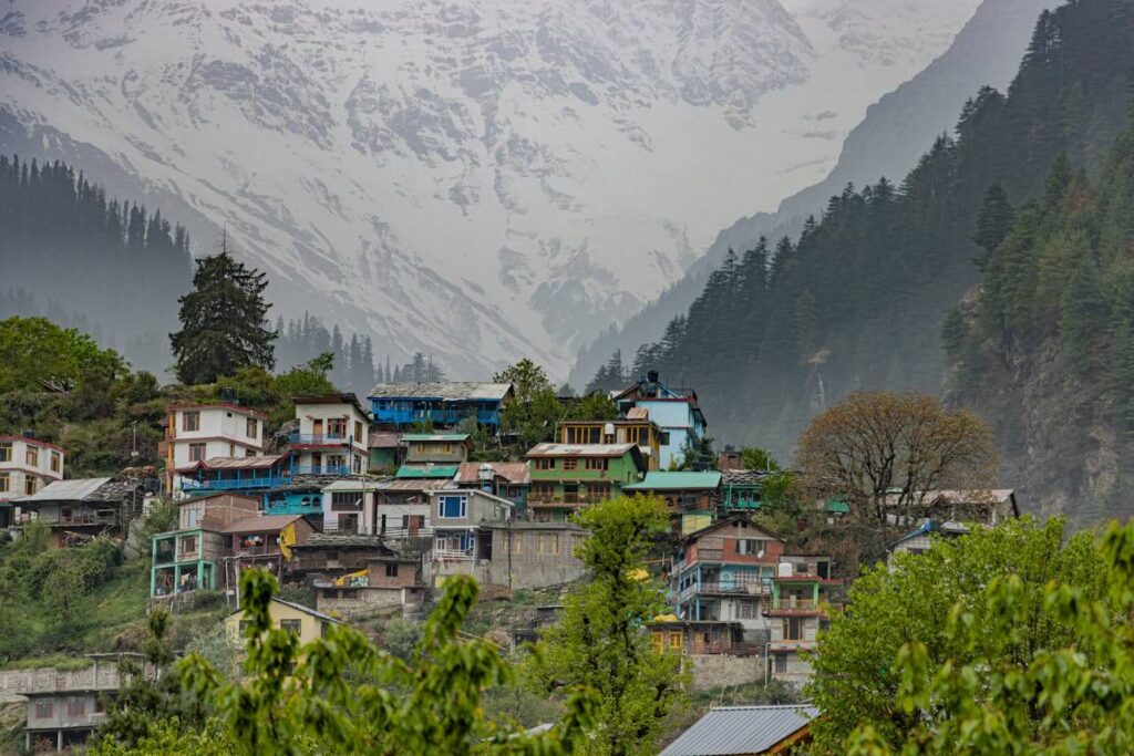 Snowy peaks and greenery around Manali
