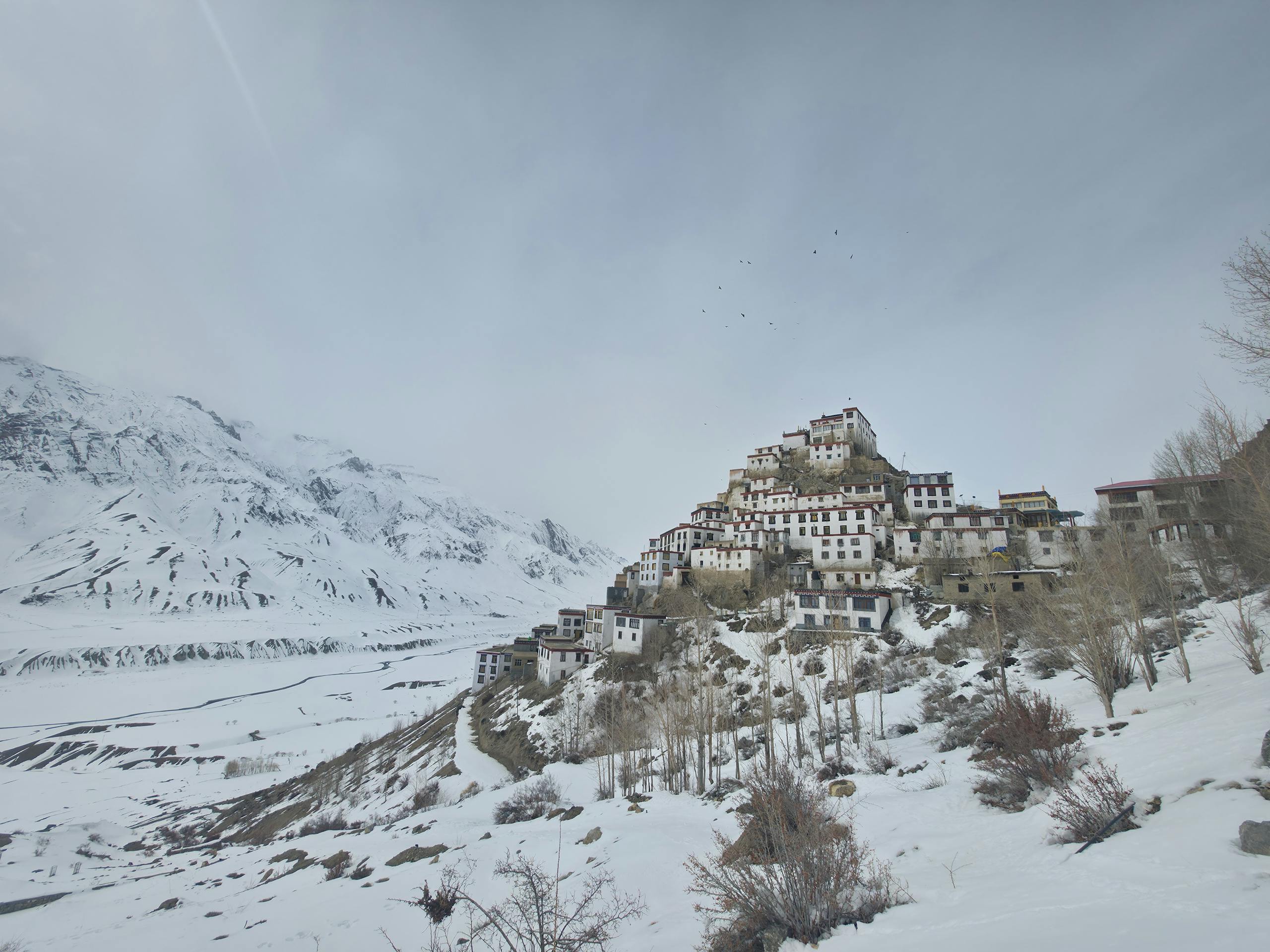 Stunning winter scene of Key Monastery surrounded by snow in Spiti Valley, Himachal Pradesh, India.